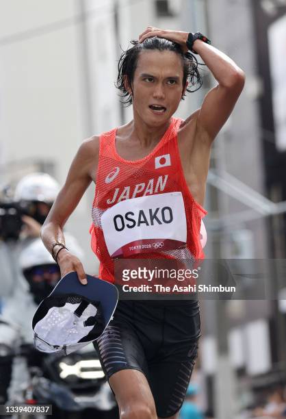 Suguru Osako of Team Japan competes in the Men's Marathon on day sixteen of the Tokyo 2020 Olympic Games on August 8, 2021 in Sapporo, Hokkaido,...