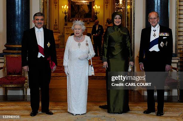 Britain's Queen Elizabeth II and her husband Prince Philip , poses for a formal picture with President of Turkey Abdullah Gul and his wife...