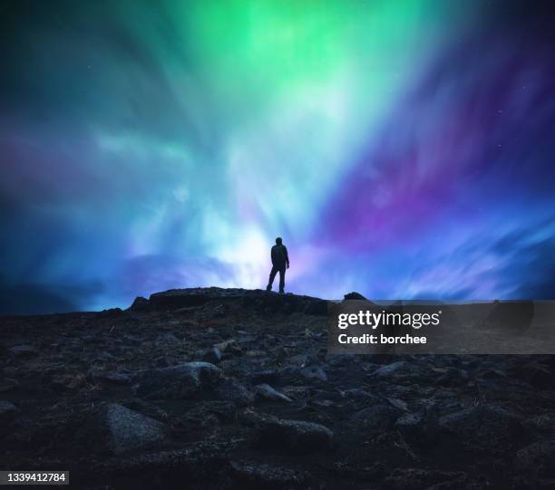 exploring iceland - man silhouette back lit stock pictures, royalty-free photos & images