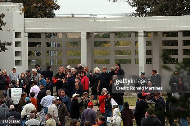 People gather on the 48th anniversary of JFK's assassination in Dealey Plaza on November 22, 2011 in Dallas, Texas. The 48th anniversary of the...