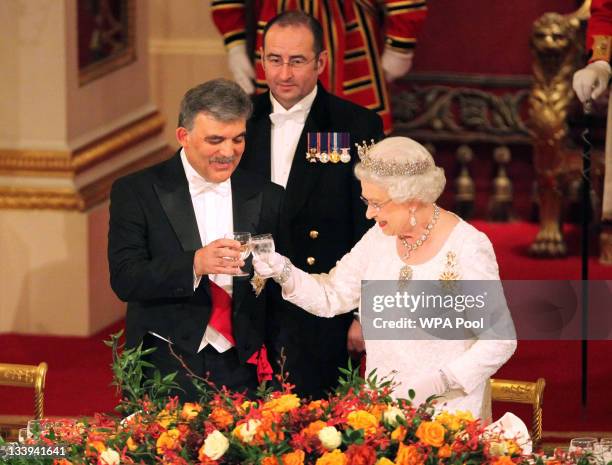 Queen Elizabeth II and President of Turkey Abdullah Gul attend a state banquet at Buckingham Palace, on November 22, 2011 in London, England....