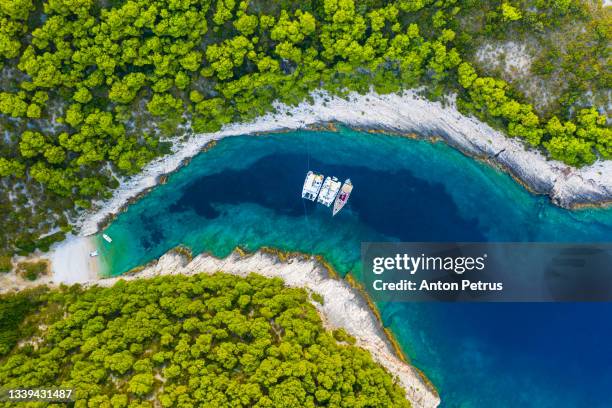 yacht in turquoise water. luxury vacation at sea, yachting - air freight transportation stock pictures, royalty-free photos & images