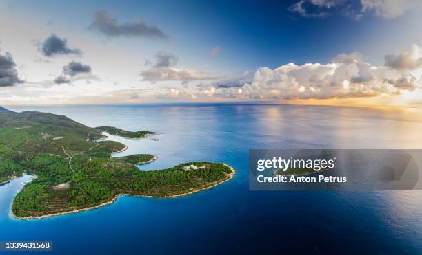 aerial view of the coastline of vis island at sunset. croatia - vis fotografías e imágenes de stock
