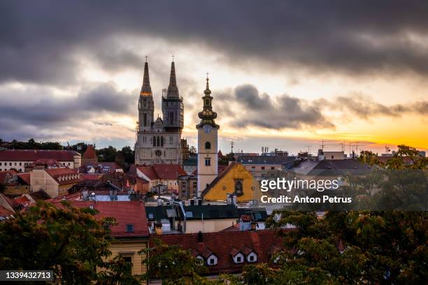 sunset view of the cathedral in zagreb. croatia - zagreb night stock pictures, royalty-free photos & images