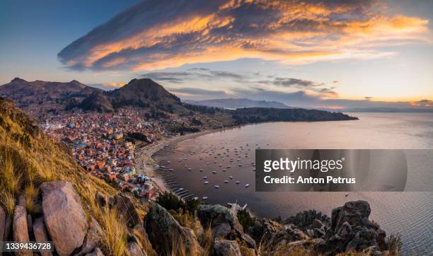 copacabana city in bolivia and titicaca lake at sunset - aerial or drone pov or scenics or nature or cityscape stock pictures, royalty-free photos & images
