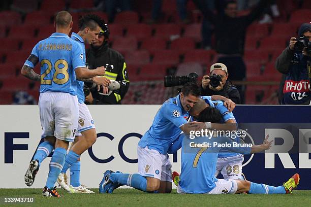 Edinson Cavani with his teammates of SSC Napoli celebrates after scoring the second goal during the UEFA Champions League Group A match between SSC...