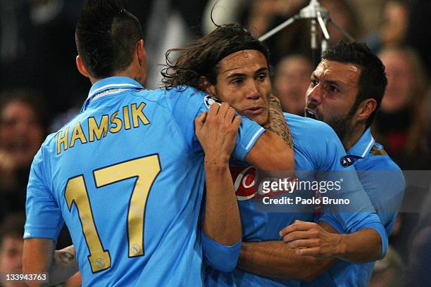 Edinson Cavani with his teammates of SSC Napoli celebrates after scoring the opening goal during the UEFA Champions League Group A match between SSC...