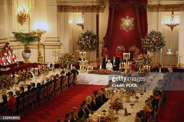 Queen Elizabeth II and President of Turkey Abdullah Gul flanked by the Princess Royal and the Duke of Edinburgh attend a State Banquet at Buckingham...