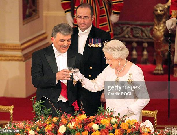 Queen Elizabeth II and President of Turkey Abdullah Gul toast at a state banquet at Buckingham Palace, London, on the first day of his State Visit to...