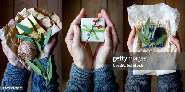 giving & receiving handmade christmas gifts - white drawstring bag stock pictures, royalty-free photos & images