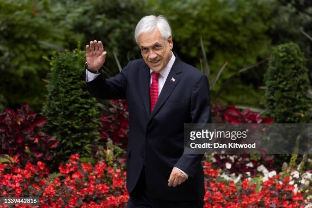 The President of Chile, Sebastian Piñera walks up Downing Street to pose for a photograph with British Prime Minister Boris Johnson on September 10,...