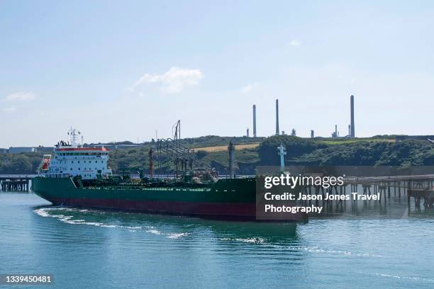 an oil tanker moored in milford haven - car transporter stock-fotos und bilder