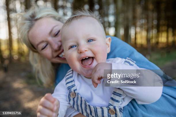 my blue eyed boy - funny baby photo stock pictures, royalty-free photos & images