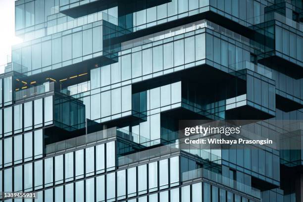 structural glass facade curving roof of fantastic office building. modern and contemporary architectural fiction with glass steel column.abstract architecture fragment. - bank column stock pictures, royalty-free photos & images