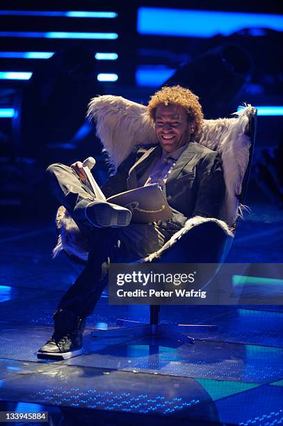 Rufus Martin performs his first song on stage during 'The X Factor Live' TV-Show on November 22, 2011 in Cologne, Germany.