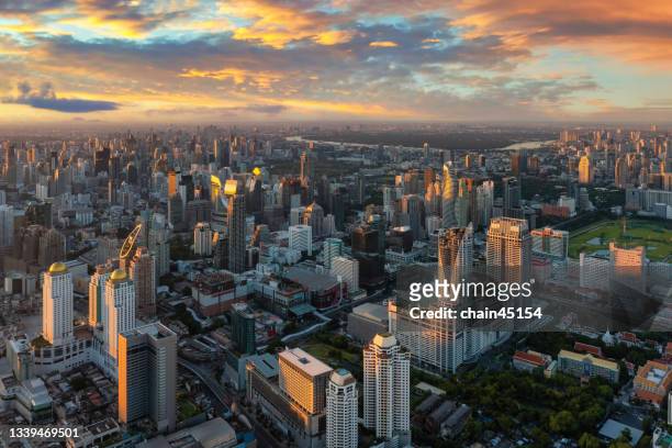 aerial view of bangkok city skyline in business area. travel destination in thailand. - bangkok aerial stock pictures, royalty-free photos & images