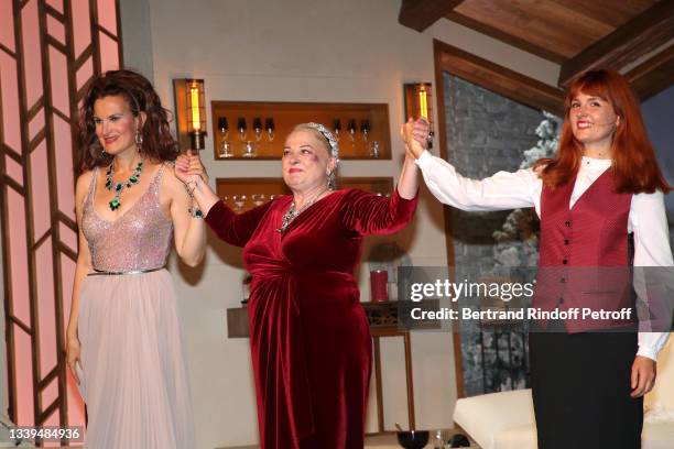 Armelle Lesniak, autor of the piece Josiane Balasko and Justine Le Pottier acknowledge the applause of the audience at the end of the "Un chalet à...