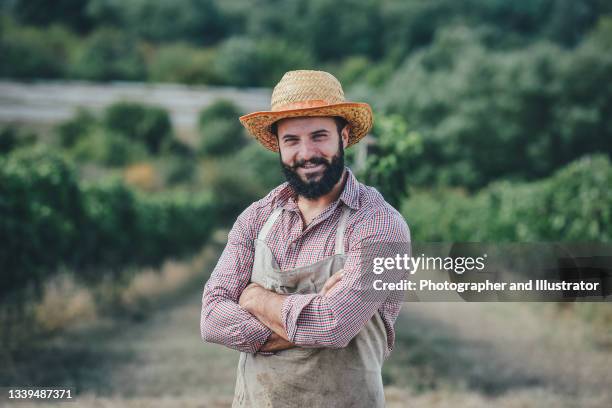 the winemaker - straw hat stock pictures, royalty-free photos & images