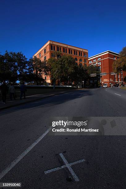 An "x" on Elm street where John F. Kennedy was assassinated near the former Texas School Book Depository, now the Dallas County Administration...