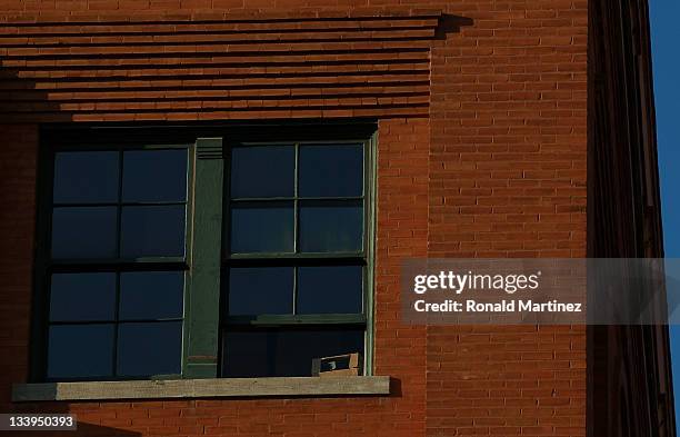 The sixth floor window of the former Texas School Book Depository, now the Dallas County Administration Building on the 48th anniversary of JFK's...