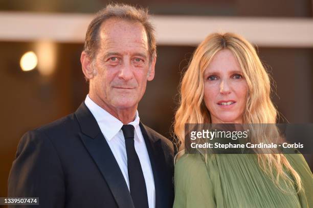 Vincent Lindon and Sandrine Kiberlain attend the red carpet of the movie "Un Autre Monde" during the 78th Venice International Film Festival on...