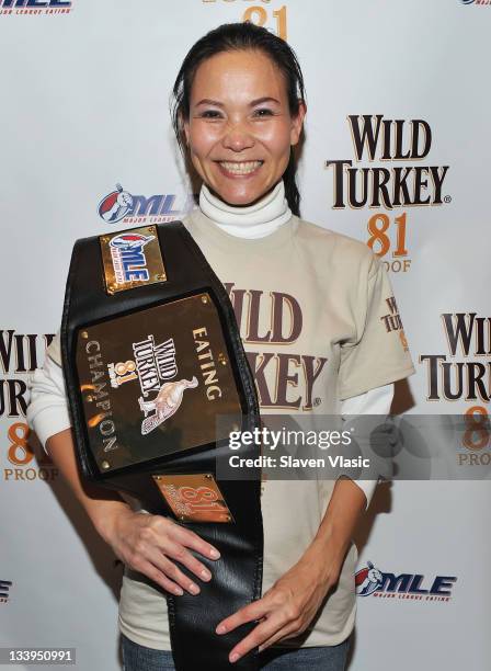 Sonya "The Black Widow" Thomas wins the 2011 Wild Turkey 81 Eating World Championship at TheTimes Center on November 22, 2011 in New York City.