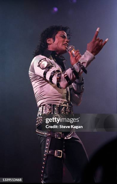 American Pop and R&B singer Michael Jackson performs onstage at the Palace of Auburn Hills, Detroit, Michigan, late October 1988. He performs three...