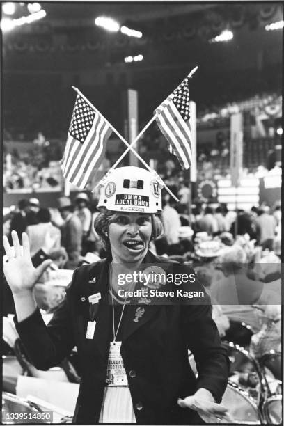 Portrait of an unidentified delegate, as she makes a funny face, posing on the floor of the Republican National Convention at Joe Louis Arena,...