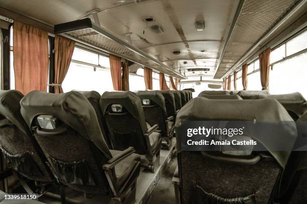 pasillo en autobus abandonado - abandonado stock pictures, royalty-free photos & images