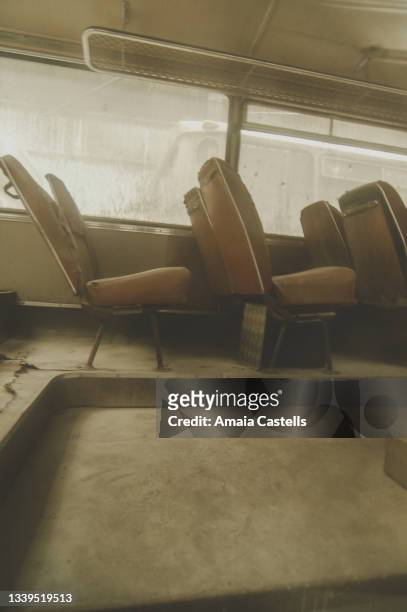 interior de autobus abandonado - abandonado stock pictures, royalty-free photos & images
