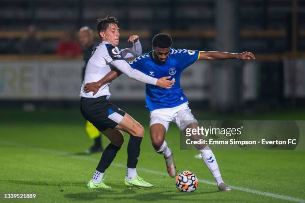 Elijah Campbell of Everton and Isaac Hutchinson of Derby County fight for the ball during the Premier League 2 match between Everton and Derby County...