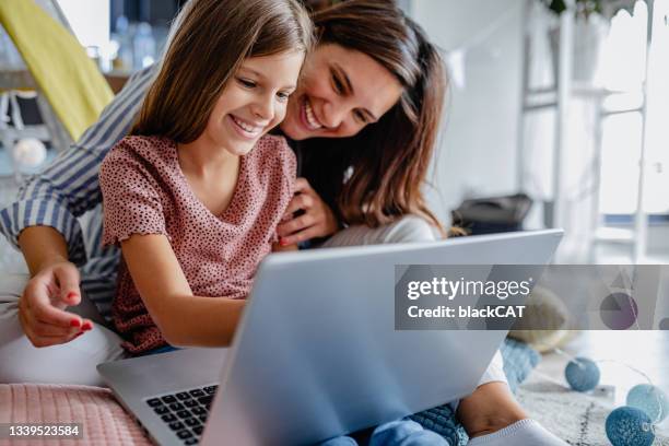 parental controls on children's computer and internet use - parental control stock pictures, royalty-free photos & images