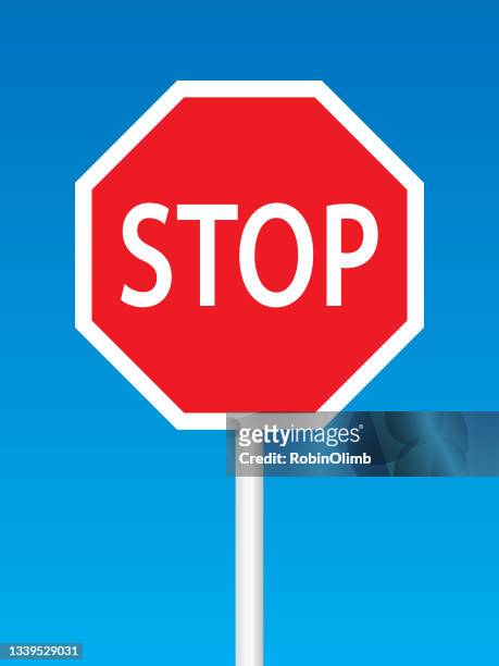 stop sign on blue sky background - stop single word stock illustrations