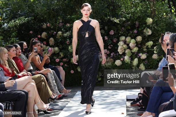 Gigi Hadid walks the runway during the Michael Kors S/S 2022 fashion show during New York Fashion Week at Tavern on the Green on September 10, 2021...