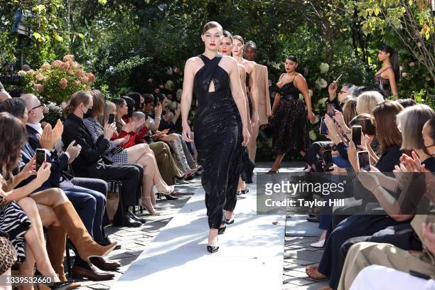 Gigi Hadid, Kendall Jenner, and more walk the runway during the finale of the Michael Kors S/S 2022 fashion show during New York Fashion Week at...