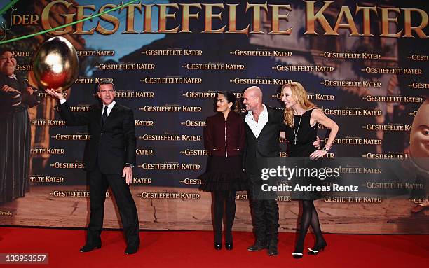 Actors Antonio Banderas, Salma Hayek, Christian Berkel and Andrea Sawatzki attend the German Premiere 'Der Gestiefelte Kater' at CineStar on November...