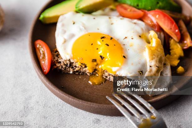 egg with salad - egg yolk stock pictures, royalty-free photos & images