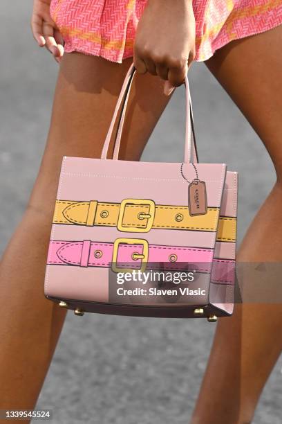 Model walks the runway, bag detail, for Coach during NYFW: The Shows on September 10, 2021 in New York City.