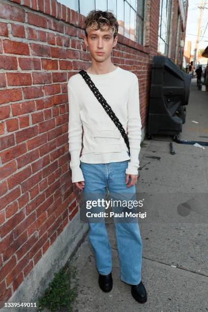 Troye Sivan attends the front row for Eckhaus Latta during NYFW: The Shows on September 10, 2021 in New York City.