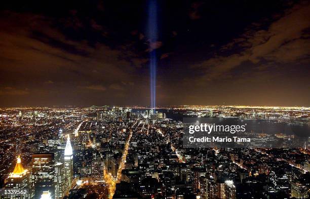 The "Tribute in Light" memorial to the World Trade Center is seen from the Empire State Building April 3, 2002 in New York City.