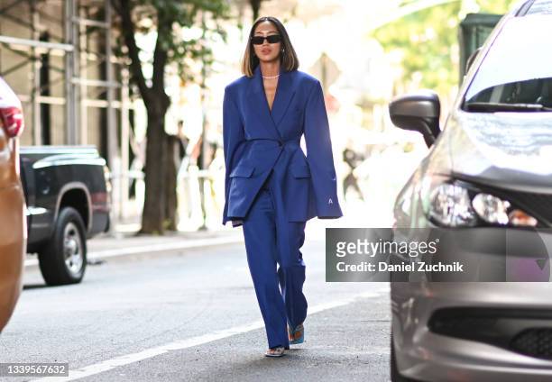 Aimee Song is seen wearing a blue Jason Wu suit outside the Jason Wu show during New York Fashion Week S/S 22 on September 10, 2021 in New York City.