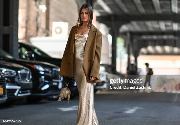 Lexi Wood is seen wearing a cream Jason Wu dress outside the Jason Wu show during New York Fashion Week S/S 22 on September 10, 2021 in New York City.
