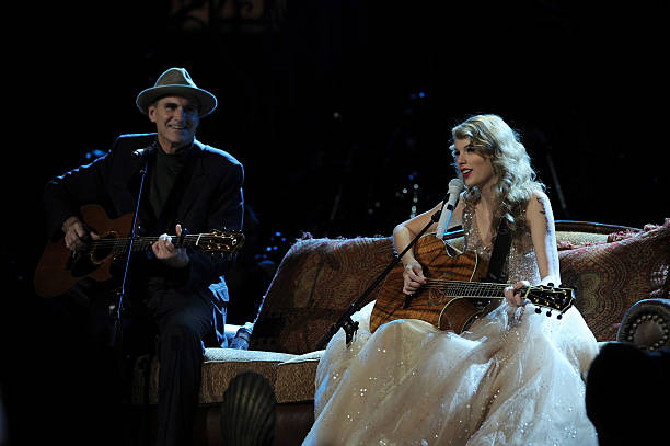 James Taylor and Taylor Swift perform onstage during the "Speak Now World Tour" at Madison Square Garden on November 22, 2011 in New York City....
