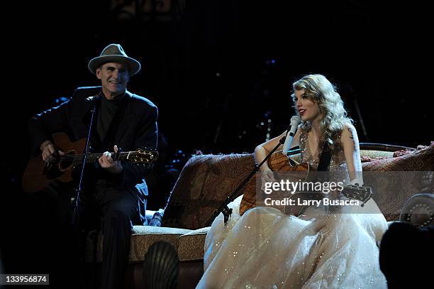 James Taylor and Taylor Swift perform onstage during the "Speak Now World Tour" at Madison Square Garden on November 22, 2011 in New York City....