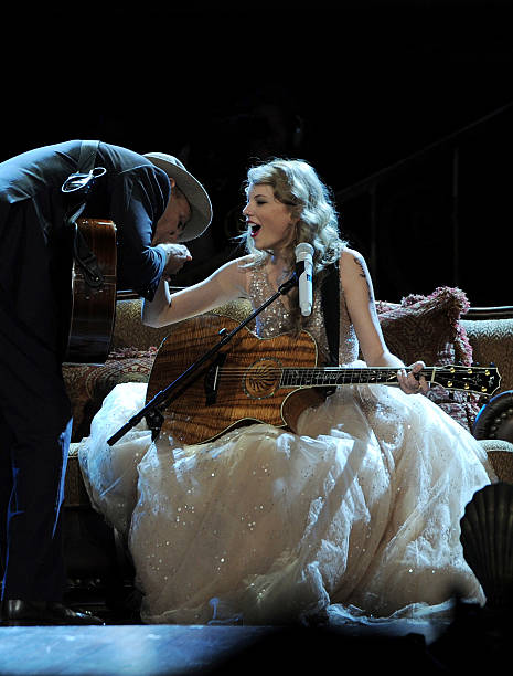 James Taylor and Taylor Swift perform onstage during the "Speak Now World Tour" at Madison Square Garden on November 22, 2011 in New York City....