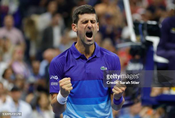 Novak Djokovic of Serbia celebrates winning match point to defeat Alexander Zverev of Germany during their Men’s Singles semifinal match on Day...
