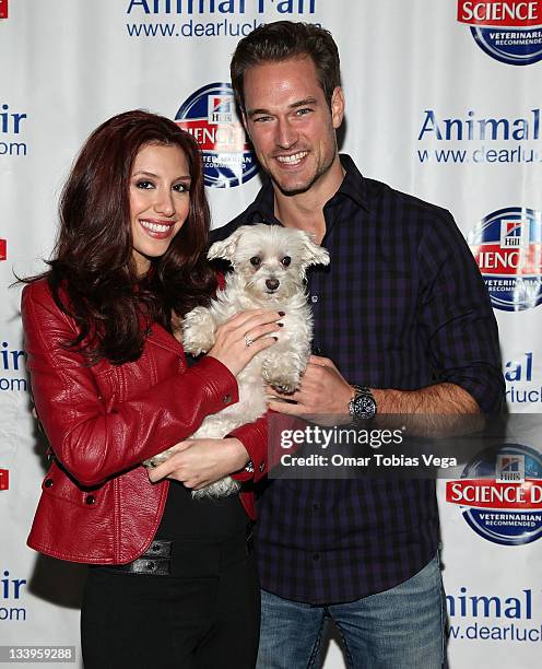 Diana Falzone, Lucky Diamond and Robert Knips attend the 2011 Paws For Style Benefit at the Muse Hotel on November 22, 2011 in New York City.