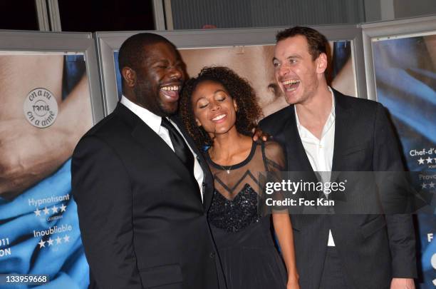 Steve McQueen, Nicole Beharie and Michael Fassbender attend the 'Shame' Paris Premiere at Mk2 Bibliotheque on November 22, 2011 in Paris, France.