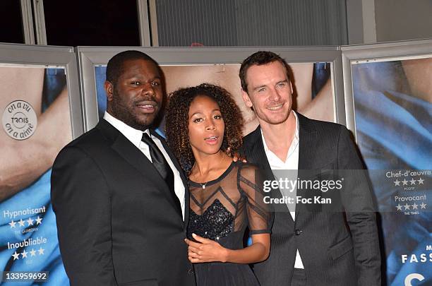 Steve McQueen, Nicole Beharie and Michael Fassbender attend the 'Shame' Paris Premiere at Mk2 Bibliotheque on November 22, 2011 in Paris, France.