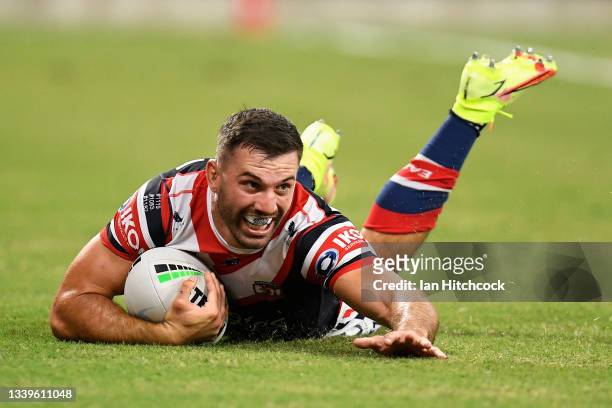 James Tedesco of the Roosters scores a try during the NRL Elimination Final match between Sydney Roosters and Gold Coast Titans at QCB Stadium, on...